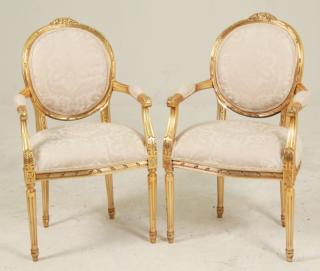 Appraisal: PAIR OF LOUIS XVI STYLE CARVED GOLD GILT WOOD FAUTEUILS