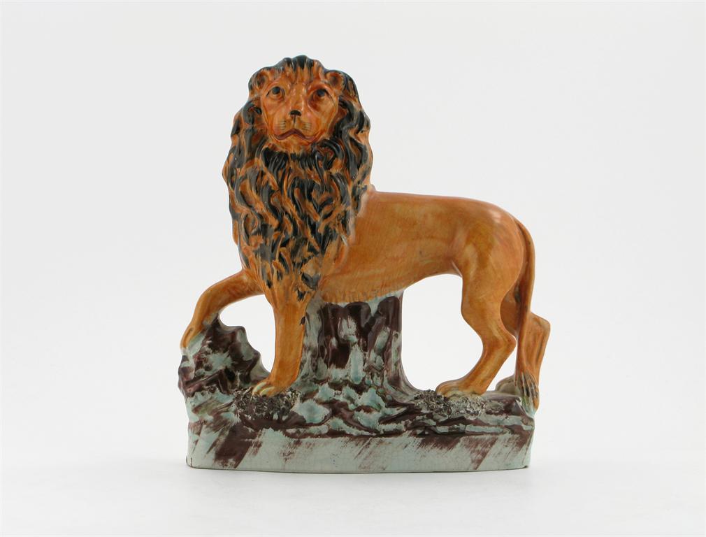 Appraisal: A large Staffordshire model of a lion