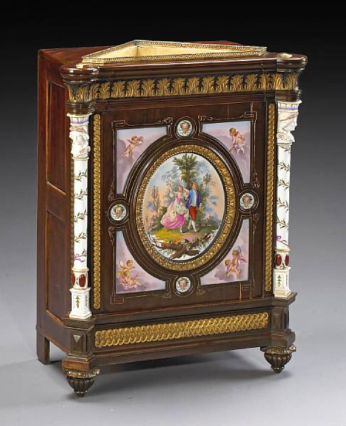 Appraisal: A Continental Neoclassical style parcel gilt porcelain mounted corner cabinet