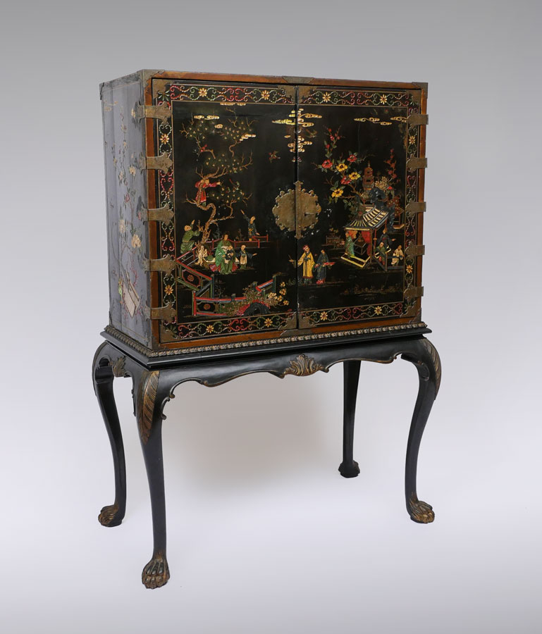 Appraisal: CHINOISERIE DECORATED LIQUOR CABINET ON STAND Black lacquer ground with