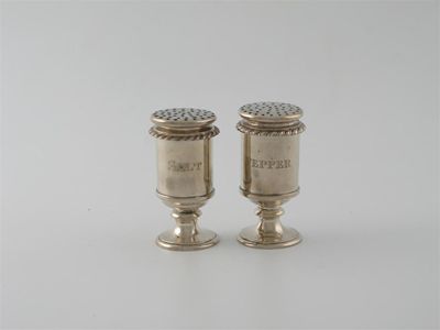 Appraisal: Indian colonial a pair of th century cylindrical condiments on