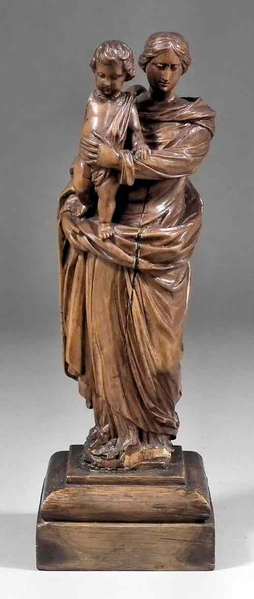 Appraisal: A th Century Flemish crossed carving of the Virgin Child