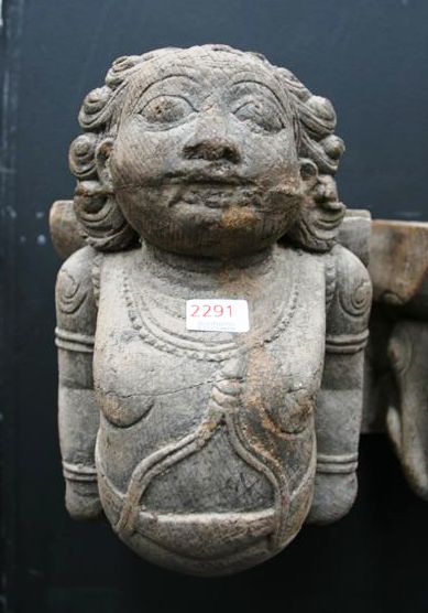 Appraisal: A pair of Dwarpals or Temple Guardians decorative wood figures