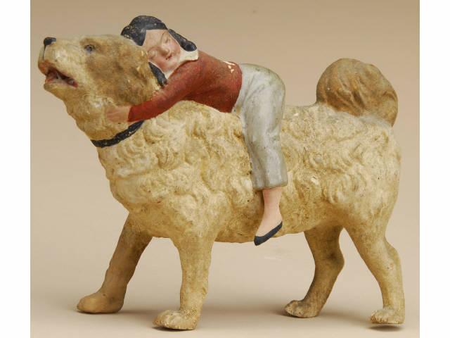 Appraisal: Child Riding St Bernard Toy Germany ca molded and painted