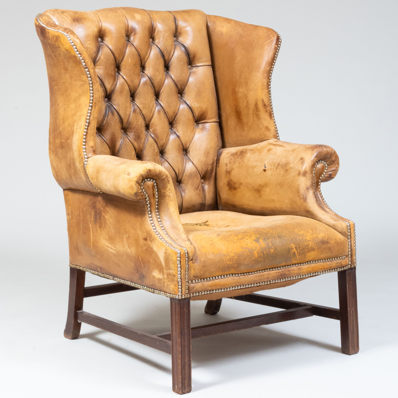 Appraisal: George III Style Mahogany and Tufted Leather Library Wing Chair