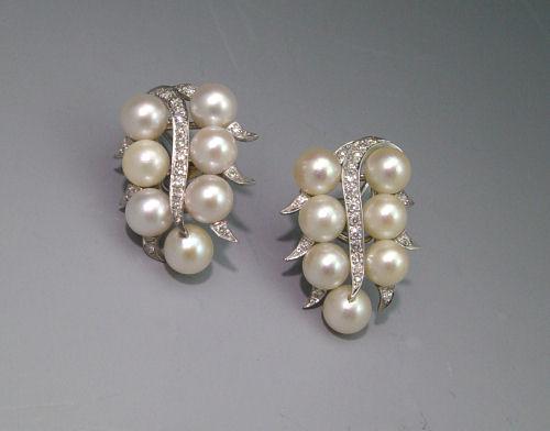 Appraisal: LUSCIOUS PEARL AND DIAMOND EARRINGS K white gold earrings contain