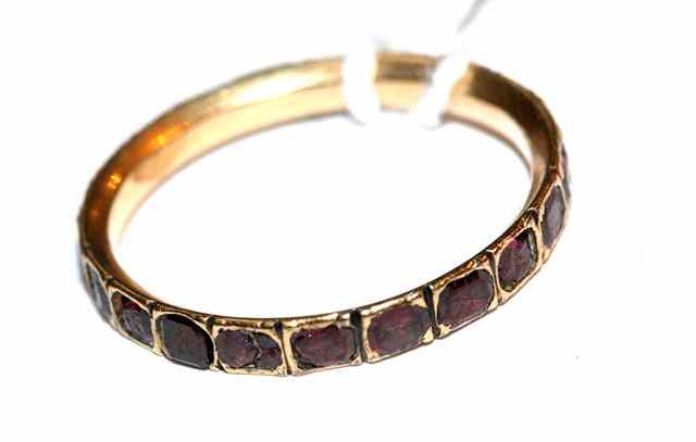 Appraisal: AN ANTIQUE GARNET SET RING old cut stones mounted in