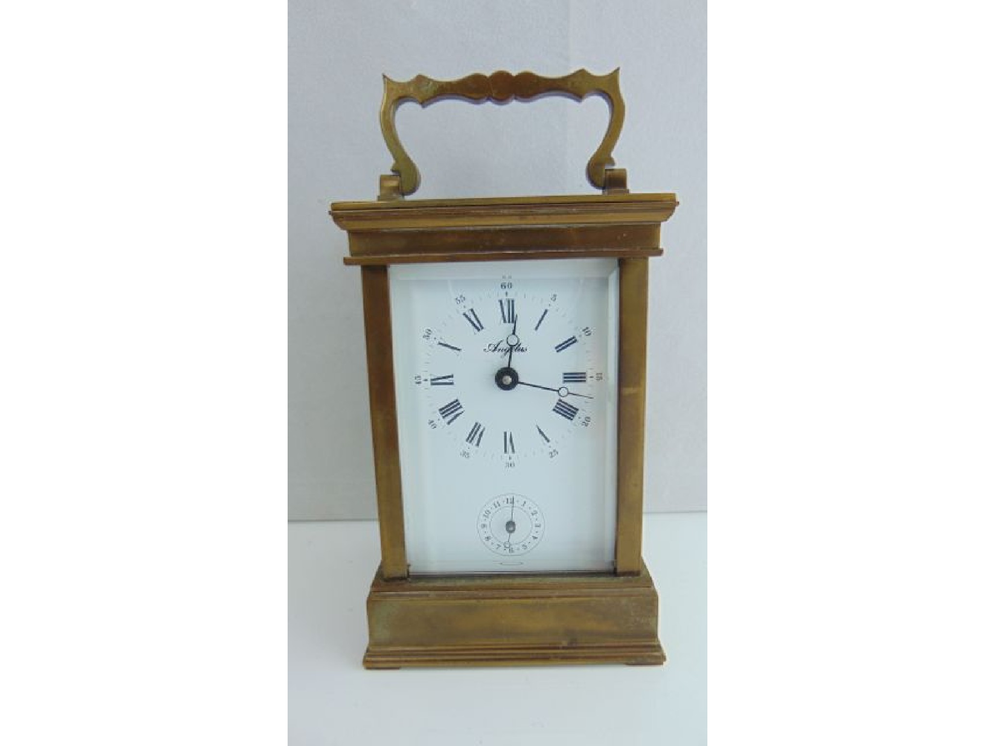 Appraisal: A simple brass carriage clock with -day movement and alarm