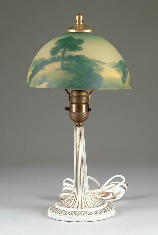 Appraisal: SMALL REVERSE PAINTED BOUDOIR LAMP The unmarked shade with landscape