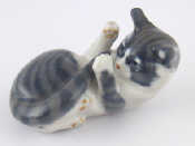 Appraisal: A Royal Copenhagen ceramic model of a kitten underglaze blue