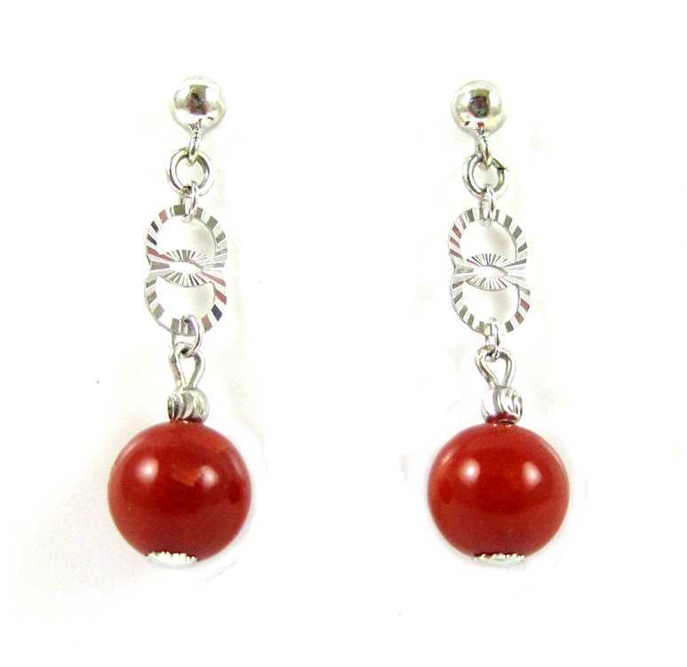 Appraisal: PAIR OF CORAL AND FOURTEEN KARAT GOLD EARRINGS each white