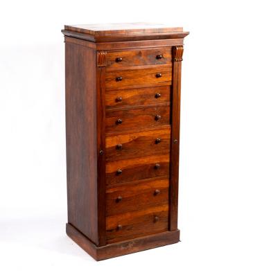 Appraisal: A Regency rosewood Wellington chest fitted six drawers and a