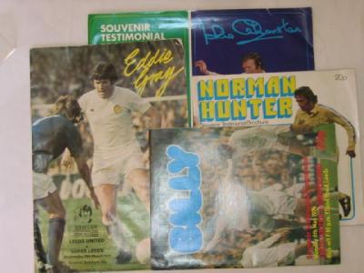 Appraisal: Four Leeds United Testimonial Match programmes comprising Norman Hunter Billy