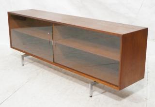 Appraisal: Low Horizontal form Teak Modern Credenza Sliding glass doors Extended