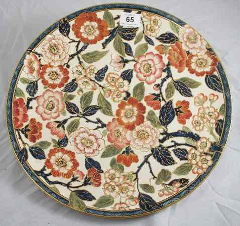 Appraisal: Minton Earthenware Charger decorated with Gilded Various Flower Heads diameter