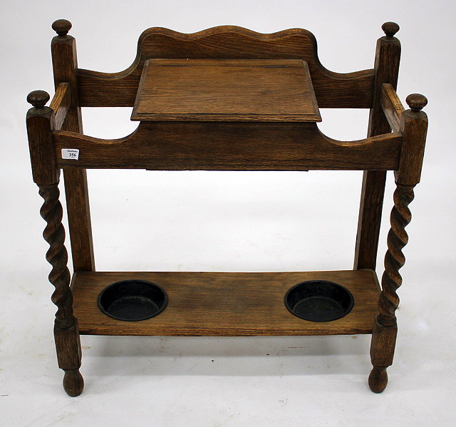 Appraisal: AN EARLY TH CENTURY OAK HALL STAND with barley twist