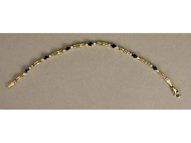 Appraisal: Pleasant ladies karat yellow gold bracelet set with oval sapphires