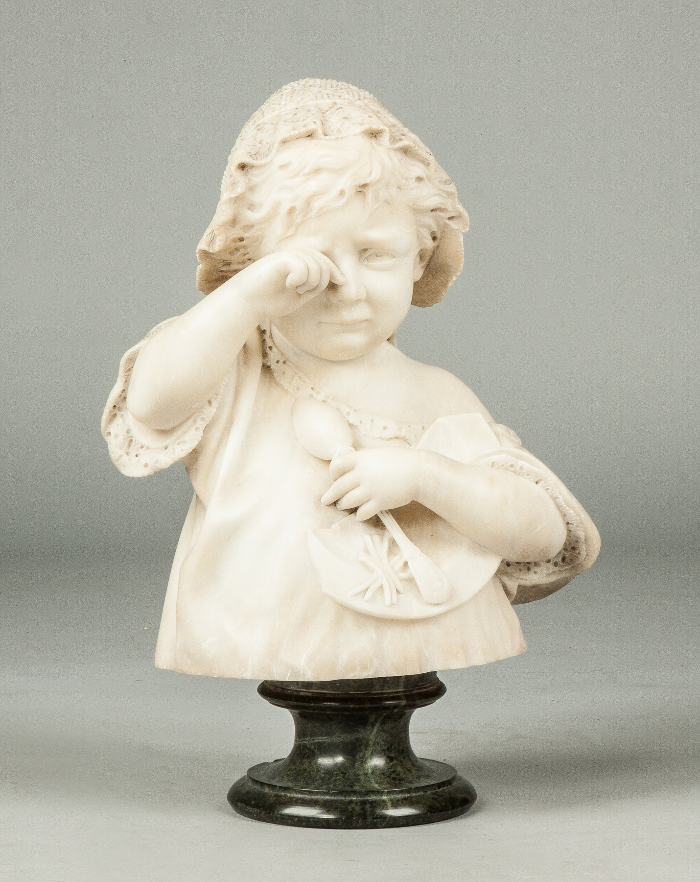 Appraisal: Carved Alabaster of Child with Spoon Broken Plate Late th