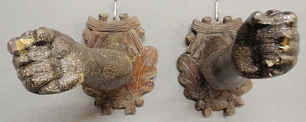 Appraisal: Pair of carved Black Forest outstretched arms with oak leaf