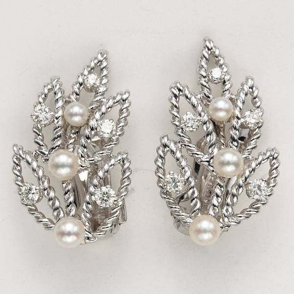 Appraisal: A pair of cultured pearl diamond and fourteen karat white