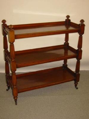 Appraisal: A VICTORIAN MAHOGANY BUFFET of three tier oblong form each