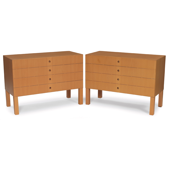 Appraisal: Italian cabinets pair beech clean-lined forms with finished backs each