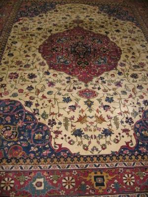 Appraisal: A PERSIAN STYLE CARPET th century the ivory field with