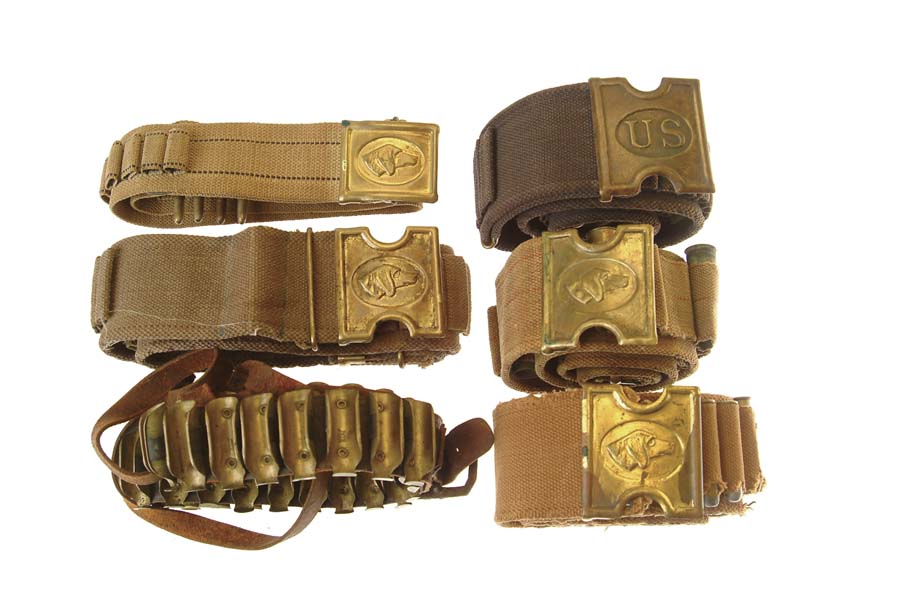 Appraisal: LOT OF CANVAS LEATHER CARTRIDGE BELTS Three wide Mills canvas