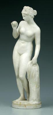 Appraisal: Carved marble female figure nude holding her clothing and fruit