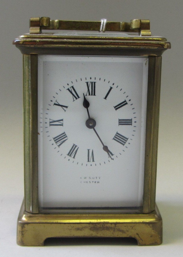 Appraisal: A gilt brass carriage clock with visible escapement th century