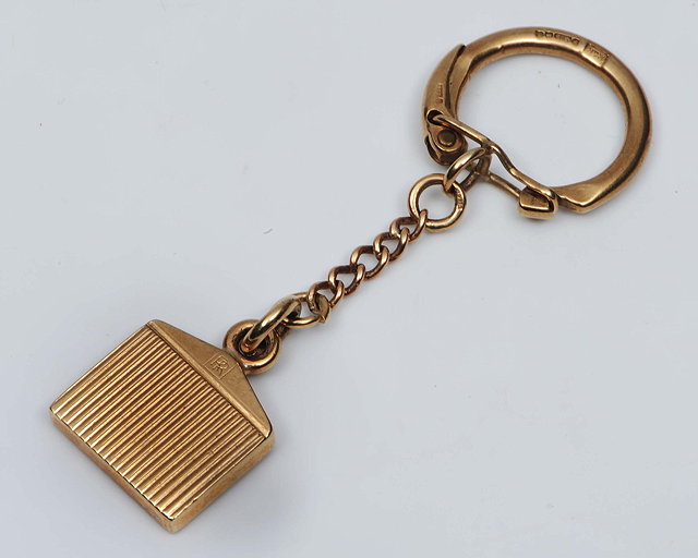 Appraisal: A CT GOLD KEYRING in the form of a Rolls