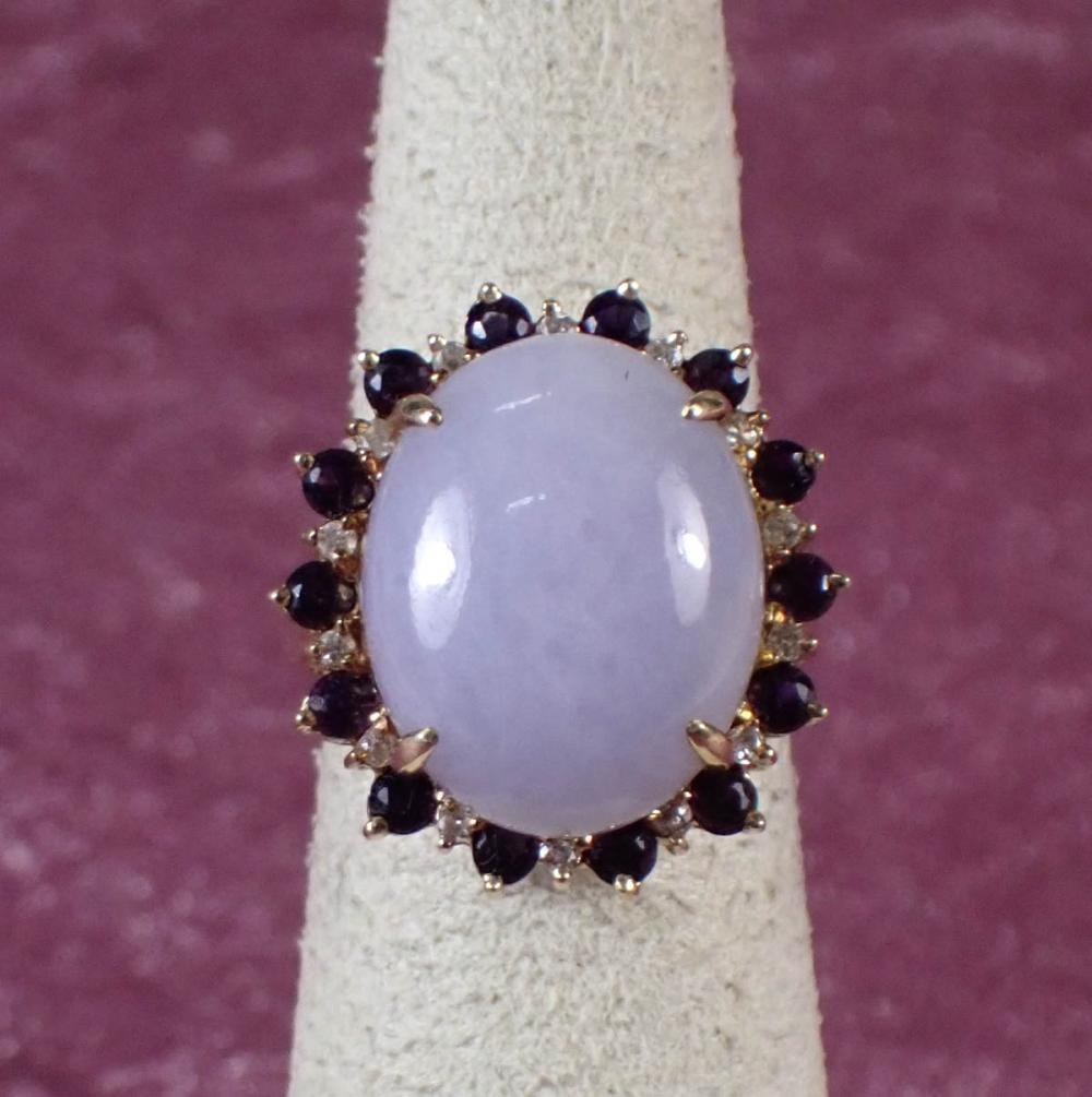 Appraisal: LAVENDER JADE AND FOURTEEN KARAT GOLD RING The yellow gold