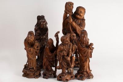 Appraisal: Six Chinese carved root wood figures of immortals largest cm