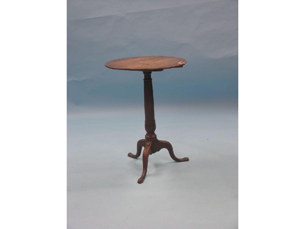 Appraisal: A Georgian oak tripod table circular top tilting upon turned