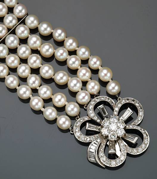 Appraisal: A cultured pearl diamond and platinum five strand bracelet estimated