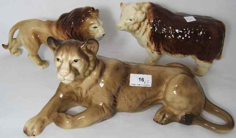 Appraisal: Melba Ware Models of a Lioness Lying Hereford Bull and