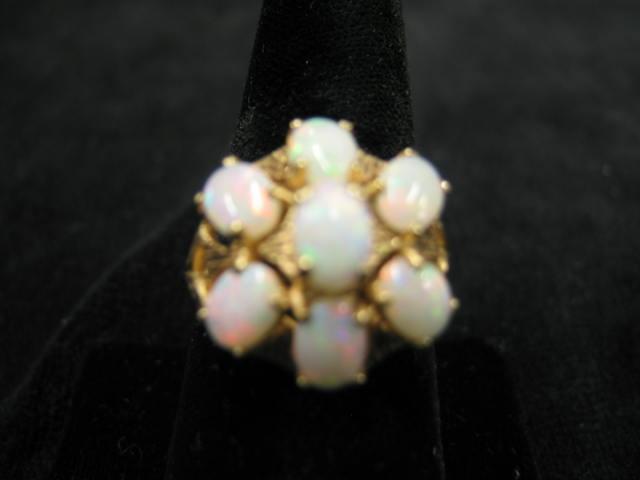 Appraisal: Opal Ring fiery gems in k yellow gold stunning