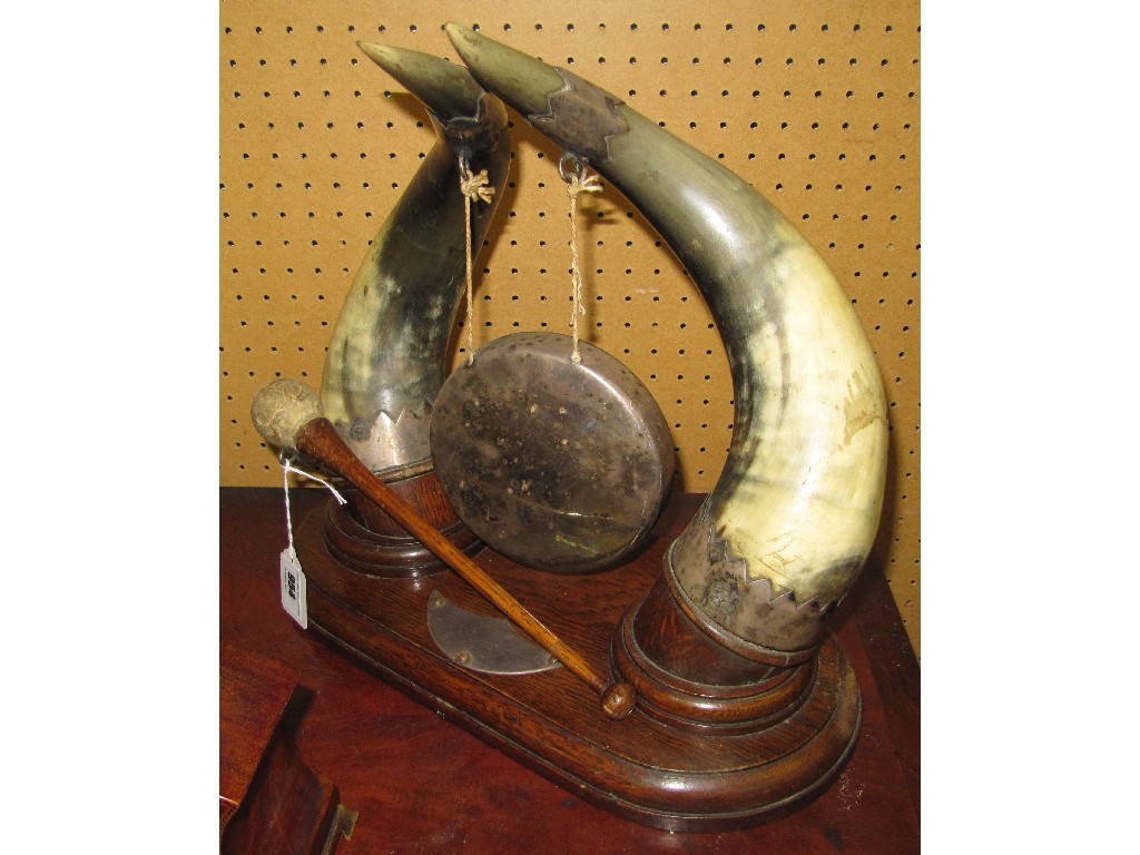 Appraisal: Oak and horn decorated table gong with plated mounts and