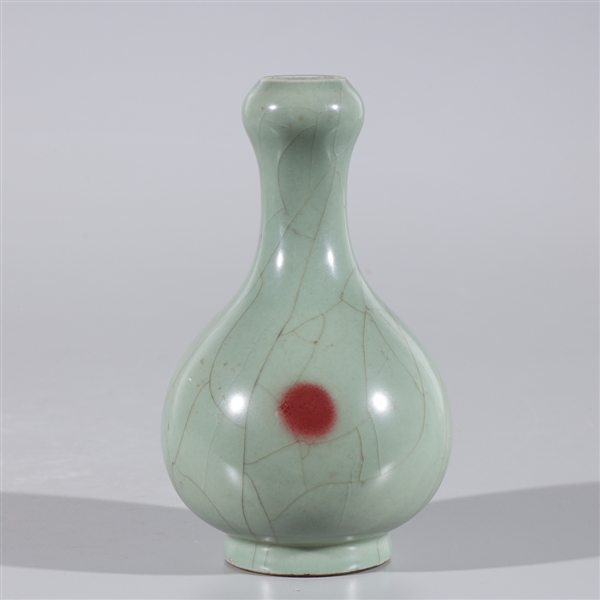 Appraisal: Small Chinese celadon glazed vase with sang de boeuf circle