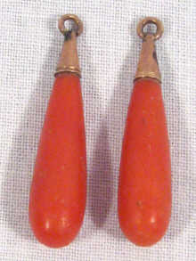 Appraisal: A pair of antique coral torpedo drop earrings wires missing