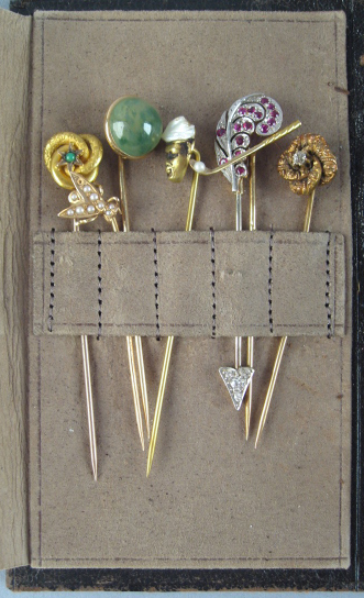 Appraisal: Seven Gold and Stone Stickpins in different forms set with