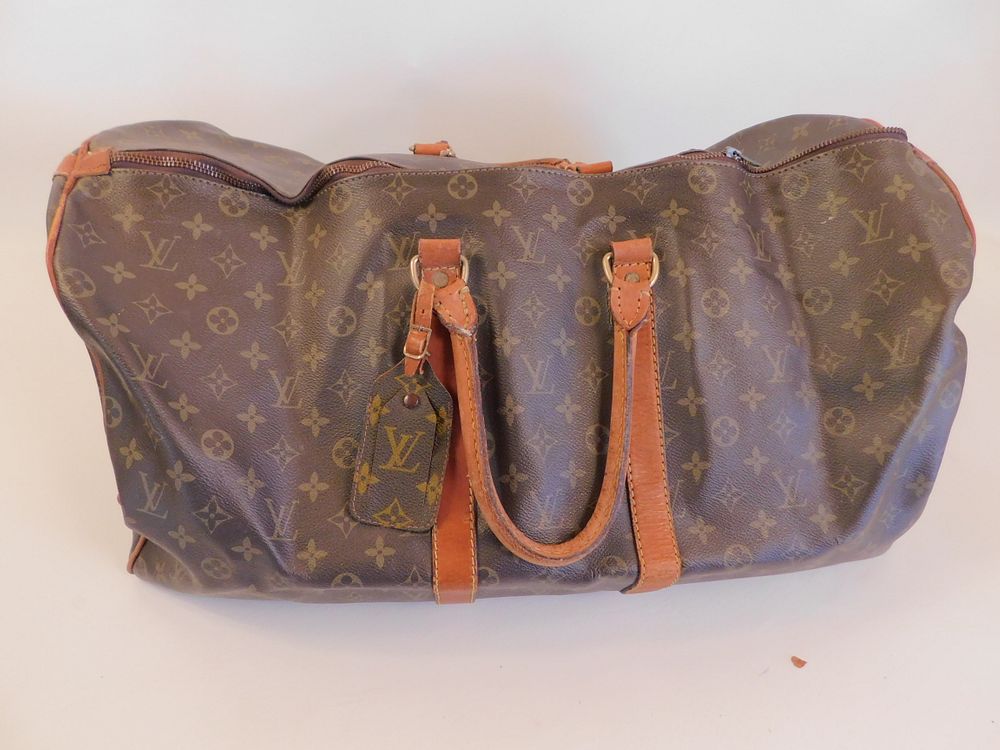 Appraisal: LOUIS VUITTON DUFFEL BAG Old Louis Vuitton logo duffel bag