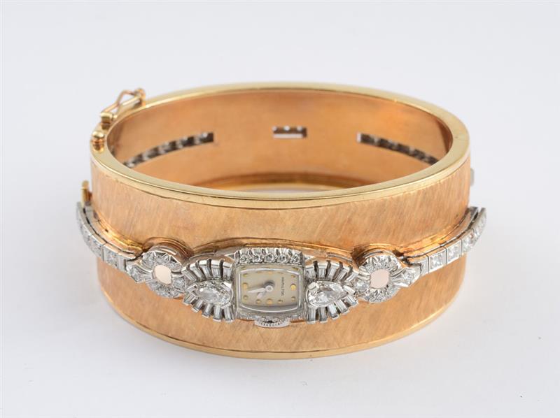 Appraisal: LADY'S GOLD AND PLATINUM BANGLE-WATCH HAMILTON Wide k gold hinged