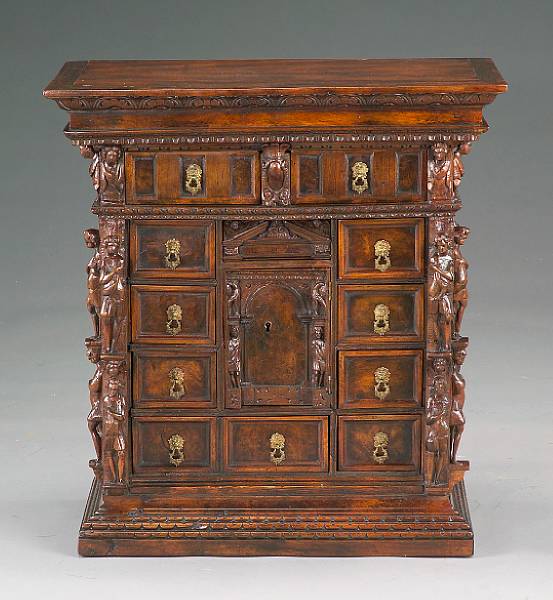 Appraisal: An Italian Baroque walnut table cabinet probably Genoa The foliate