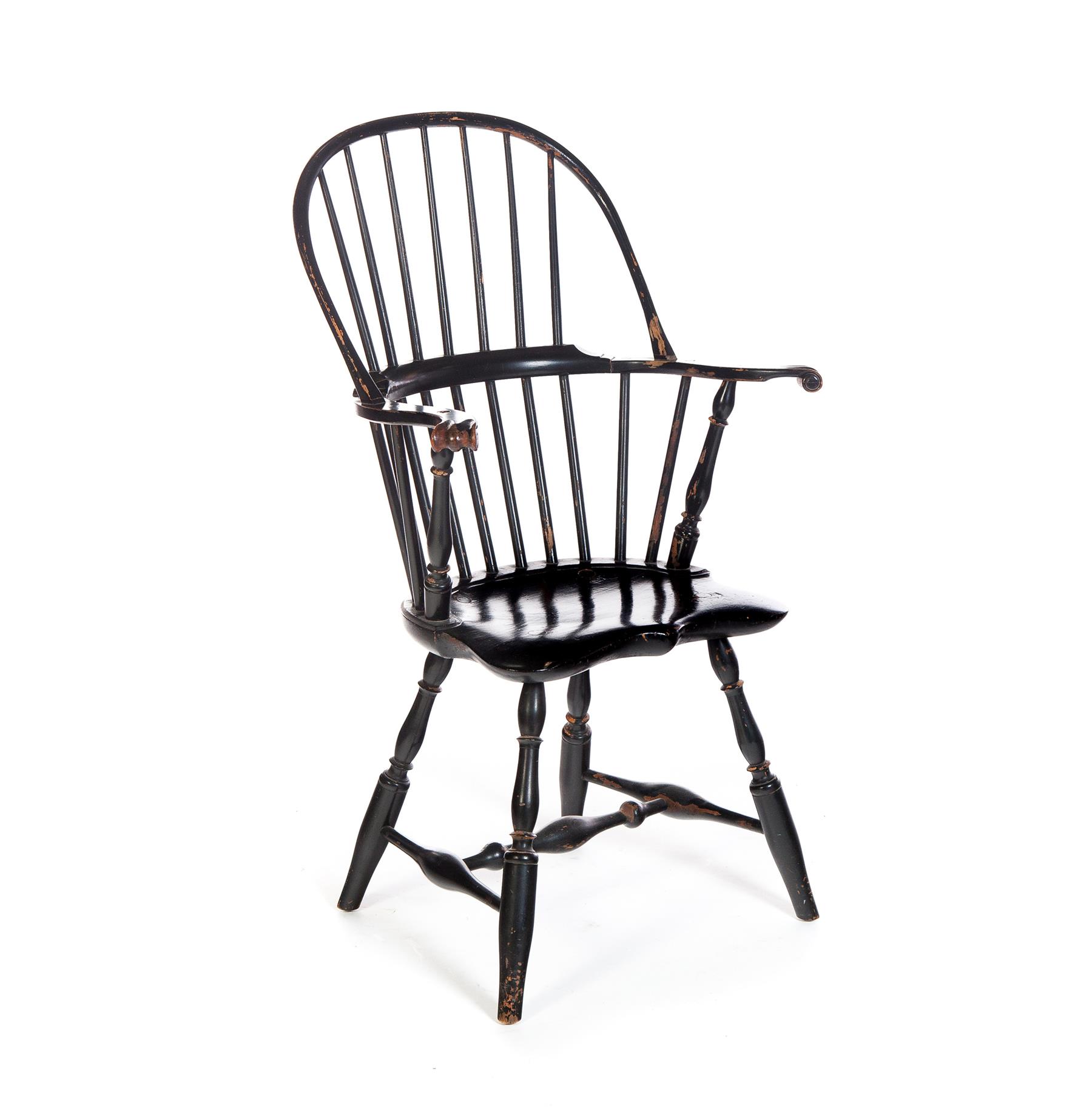 Appraisal: KITTINGER WINDSOR-STYLE ARMCHAIR American nd half- th century Sackback knuckle