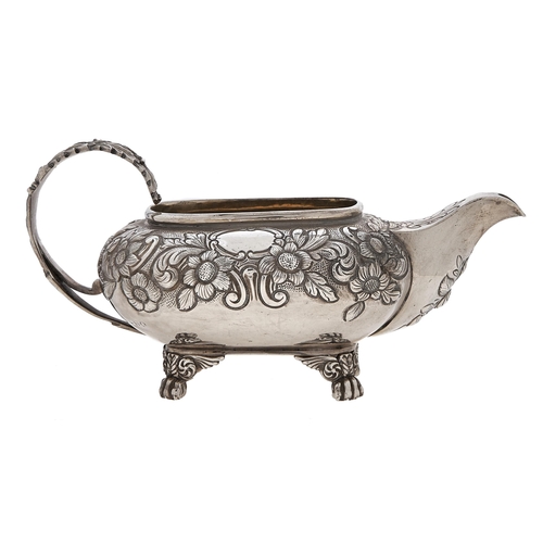 Appraisal: A George III silver cream jug with acanthus handle and