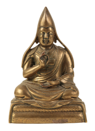 Appraisal: A SINO-TIBETAN BRONZE FIGURE OF A SEATED LAMA Ming or