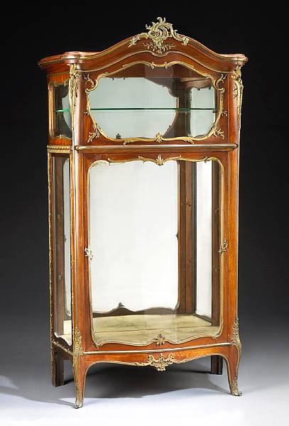 Appraisal: A Louis XVI style gilt bronze mounted mahogany vitrine cabinet