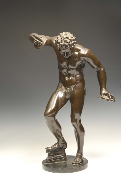 Appraisal: A BRONZE FIGURE of a cymbal player after the Antique