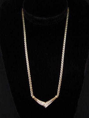 Appraisal: BAGUETTE DIAMOND NECKLACE K yellow gold necklace contains thirty five